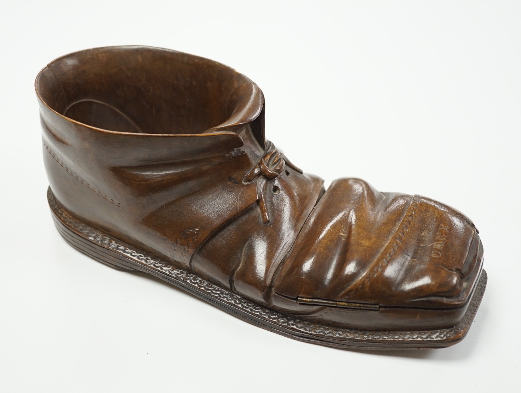 A Swiss Caux treen 'boot' vesta case, 22cm long